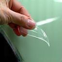 Close-up of paint protection film being applied